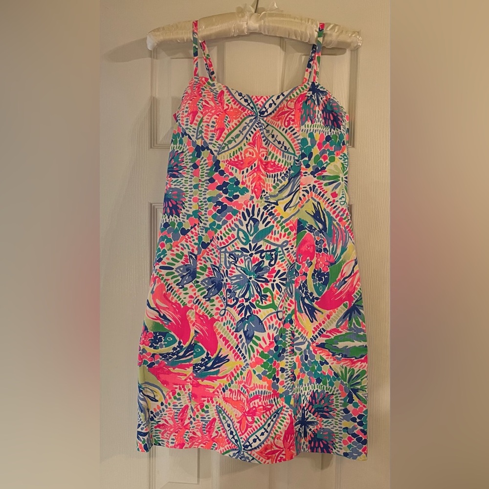 Lilly Pulitzer tropical print dress with small straps and tie close in the back